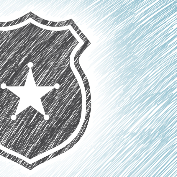 An illustration of a police badge’s shield.
